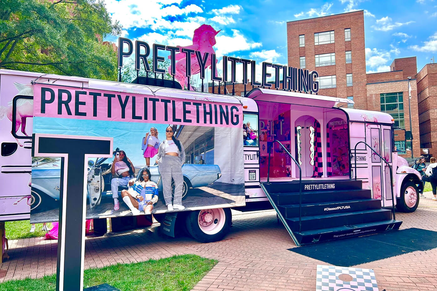 The Pink PLT bus setup outside a University last year