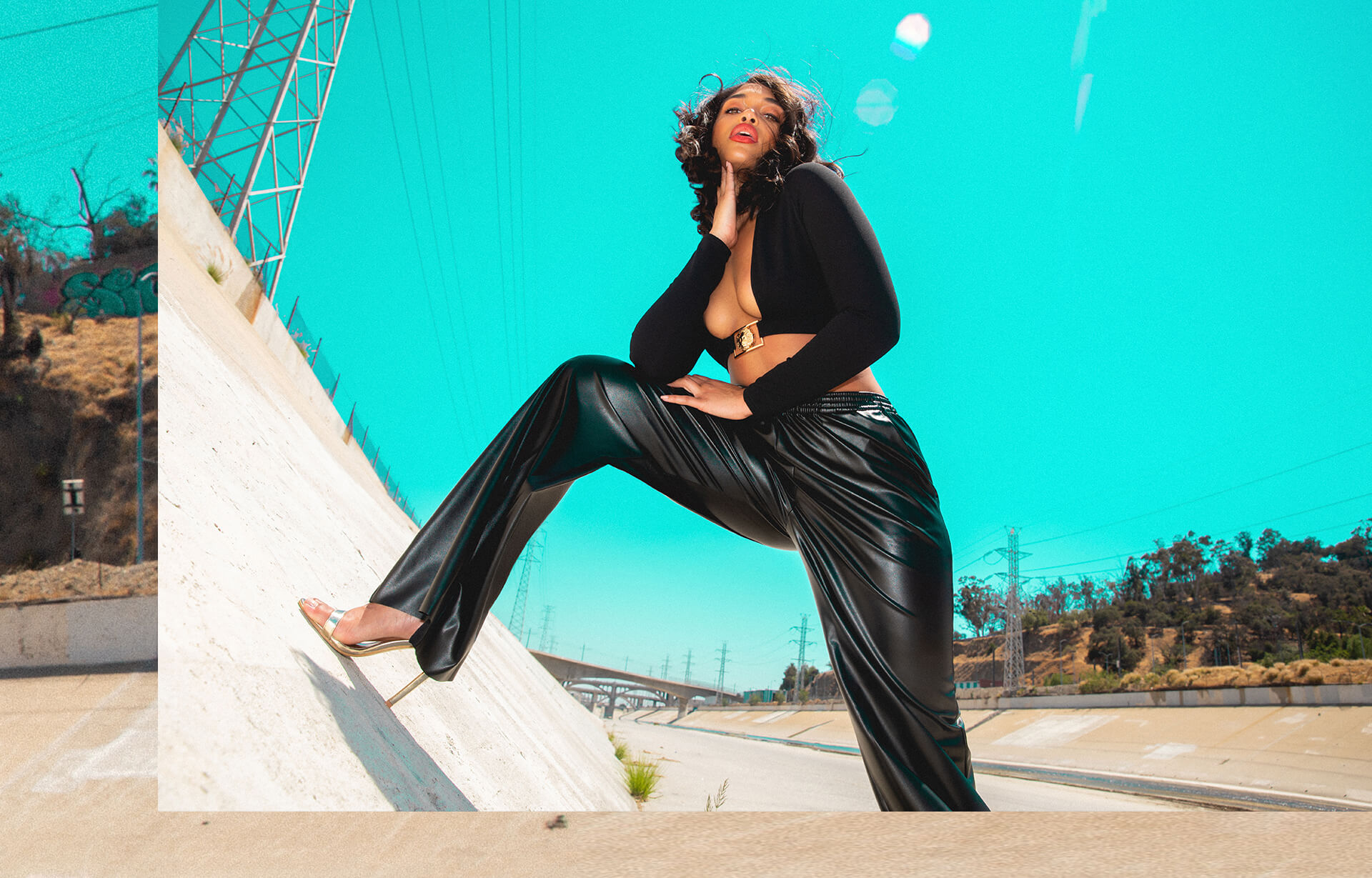 Lori Harvey Shoot 1 Black Plunge Crop Top & Black Faux Leather Trousers Desktop