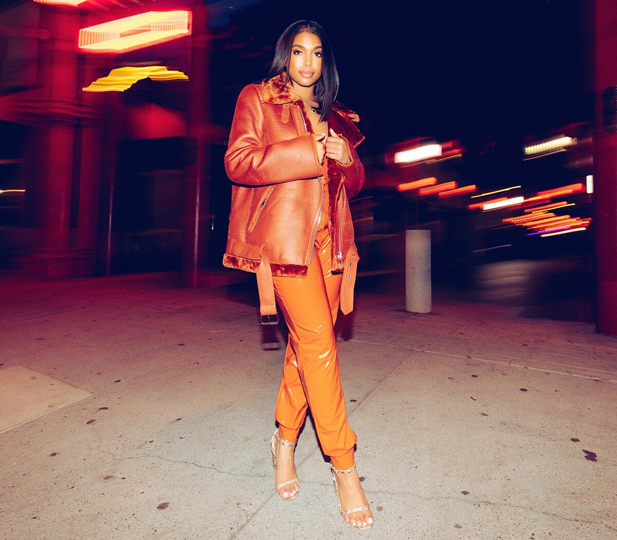 Lori Harvey Shoot 1 Orange Lycra Trousers and Orange Trucker Jacket Mobile