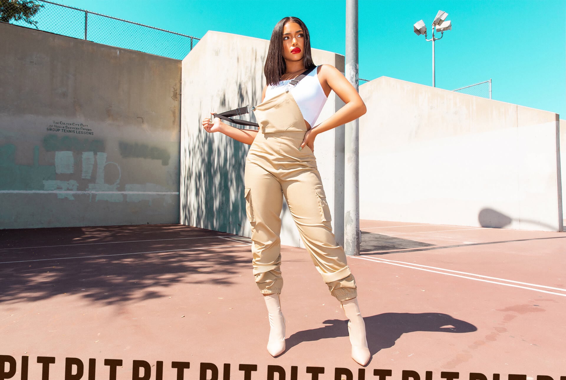Lori Harvey Shoot 1 Black Plunge Crop Top & Black Faux Leather Trousers Desktop