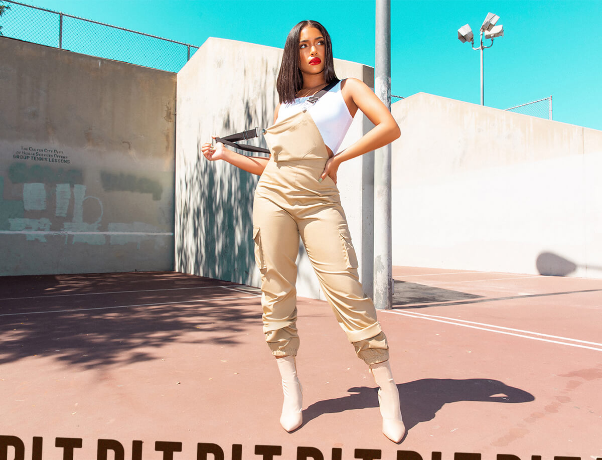 Lori Harvey Shoot 1 Black Plunge Crop Top & Black Faux Leather Trousers Mobile