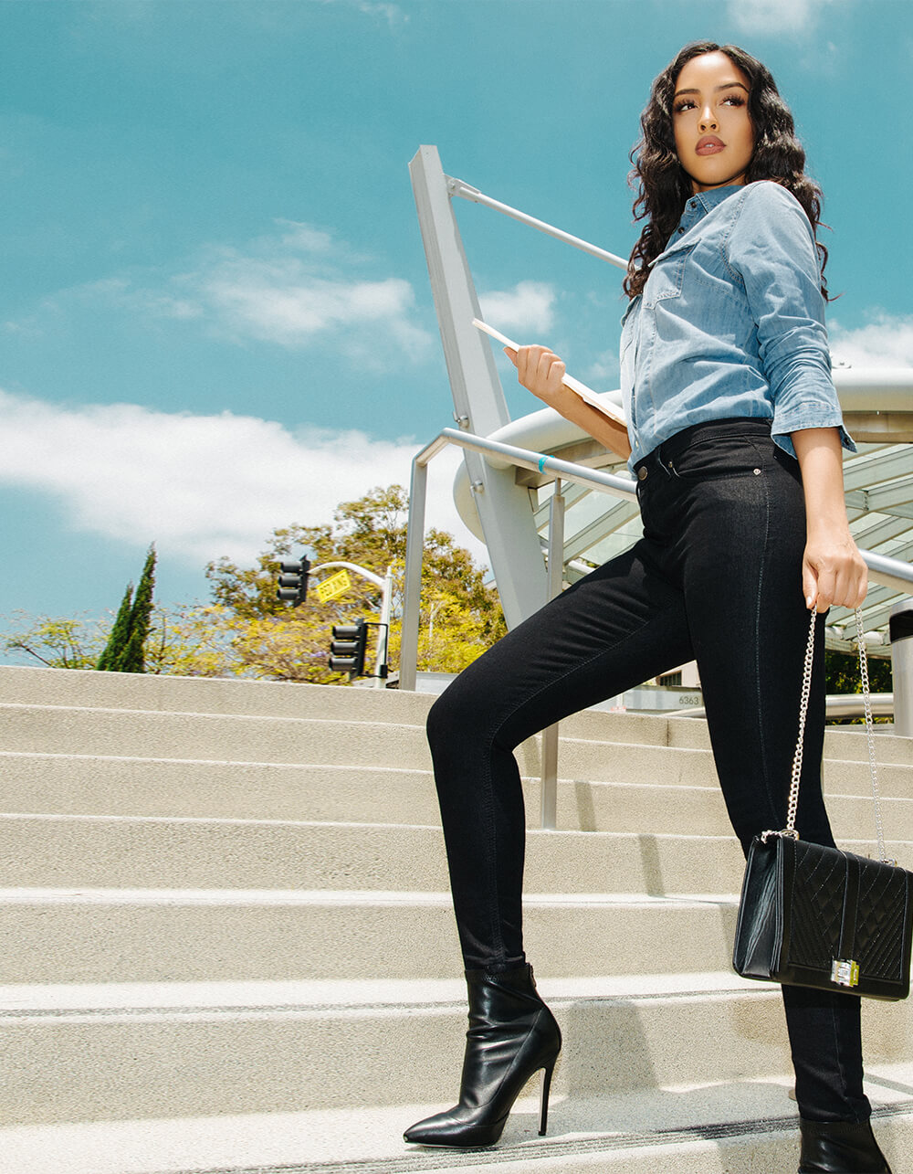 blue denim light wash shirt and black denim jeans mobile